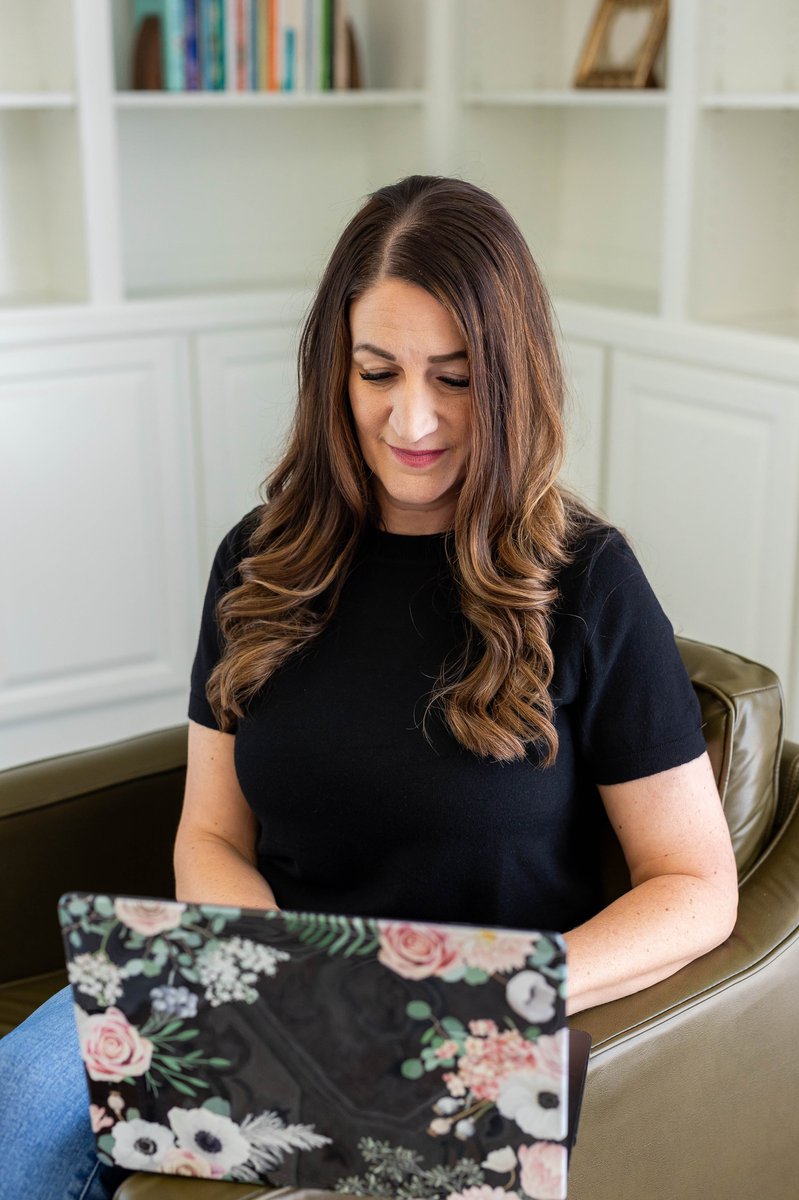 Trisha McWilliams working with a client in the Renewed Roots office