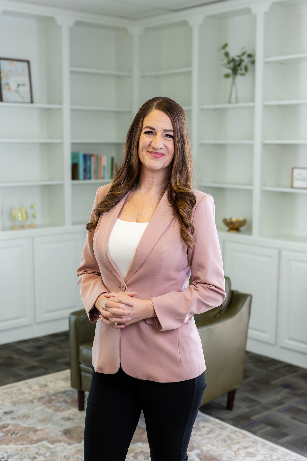 Trisha McWilliams, LCSW — owner of Renewed Roots Counseling